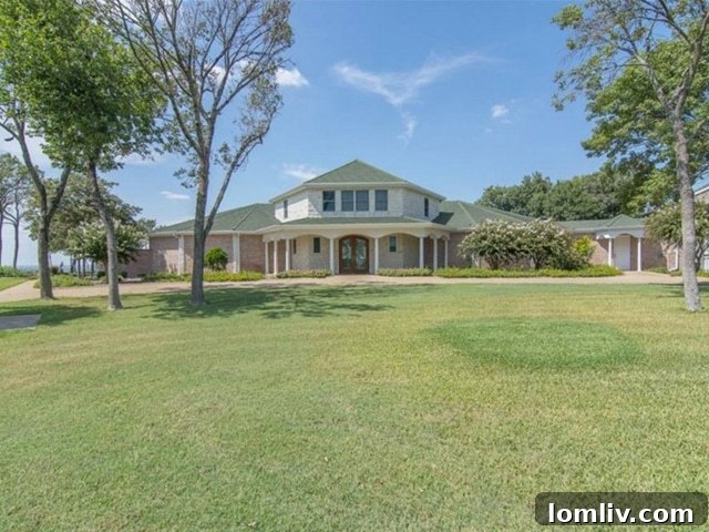 Gorgeous estate on 5+ acres in Cedar Hill with stunning views of Joe Pool Lake.