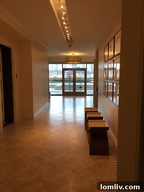 Inviting view of the private heated pool area at The Stoneleigh Residences, surrounded by lush landscaping.