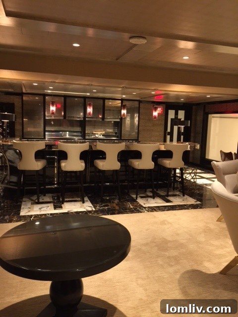 Luxurious owner's bar at The Stoneleigh Residences, a perfect spot for relaxation and socializing.