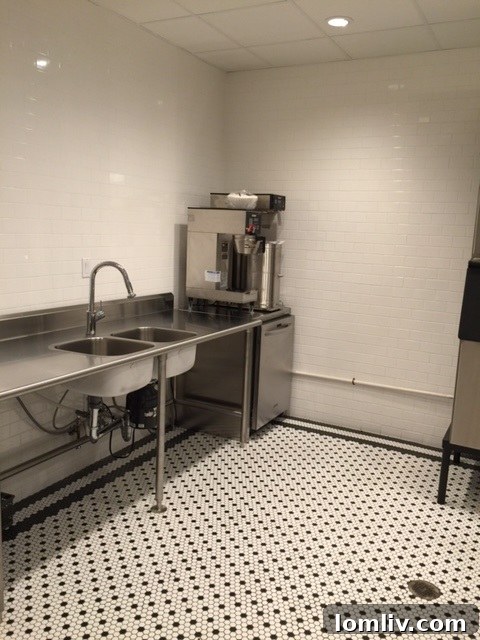 A second view of the pristine catering kitchen at The Stoneleigh Residences, highlighting its modern facilities.