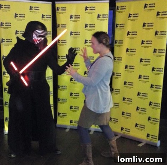 Star Wars fan attempting to use the Force against Kylo Ren