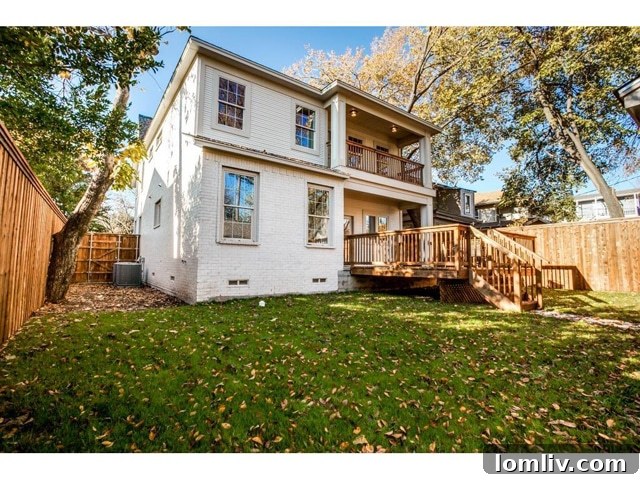 Kings Highway New Build: Modern Decor, Exceptional Finishes 17 Rear view of 1117 Kings Highway showcasing the back deck and balcony