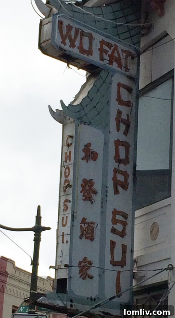 Wo Fat's building facade, a historic landmark in Honolulu's Chinatown, evoking Hawaii Five-O memories.