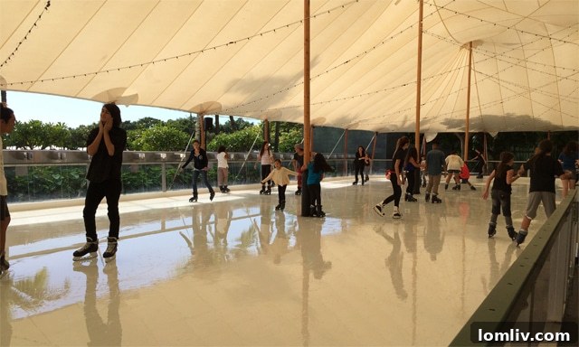 Outdoor ice skating at Ward Village Sales Center in Hawaii, a unique seasonal attraction.