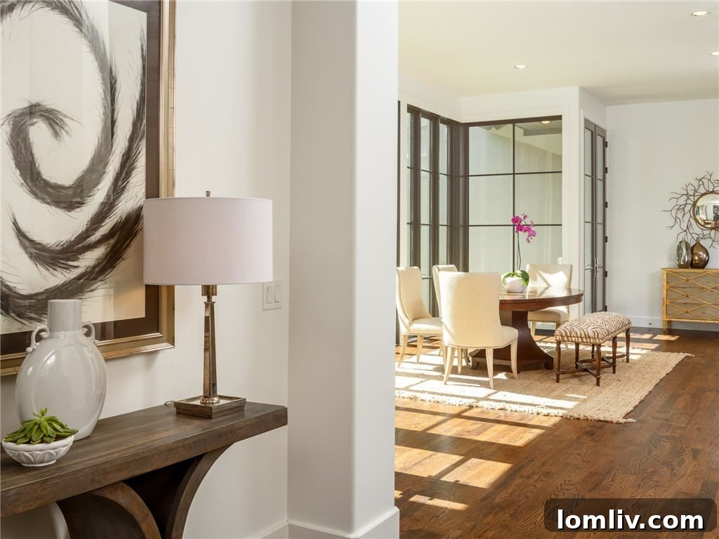 Contemporary dining room with floor-to-ceiling windows and outdoor views