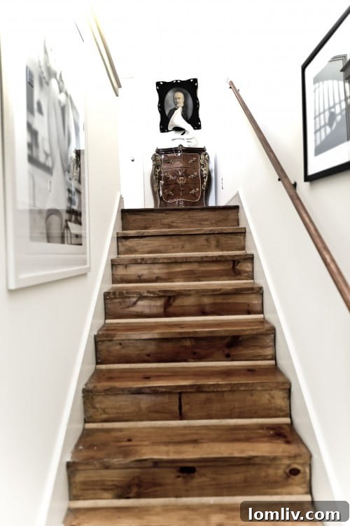 An interior view of a historic home's eclectic hall, showcasing original architectural details and character that tell a story of the past.