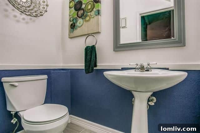 A closer look at the kitchen's modern fixtures and subway tile backsplash, adding a touch of contemporary elegance.