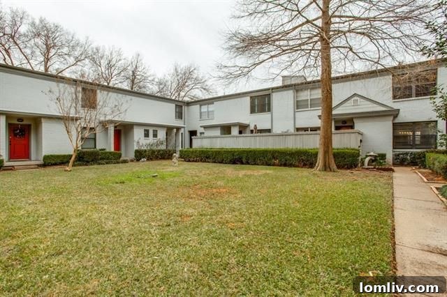 Lush, well-manicured landscaping and mature trees within the Westbury Park community, enhancing its serene atmosphere.