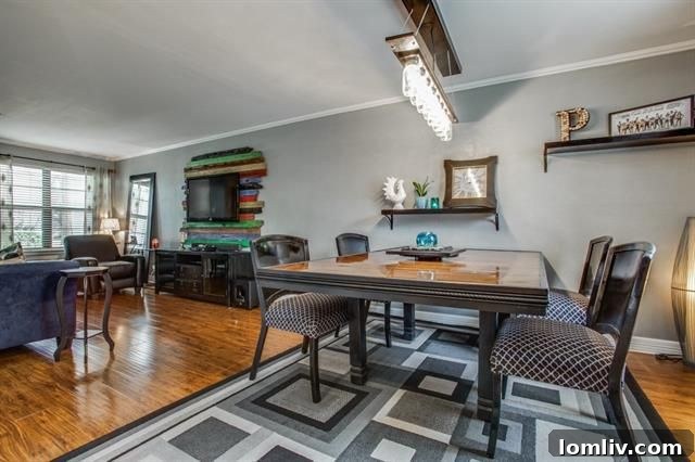 Another perspective of the updated kitchen, highlighting the ample counter space and stylish design.