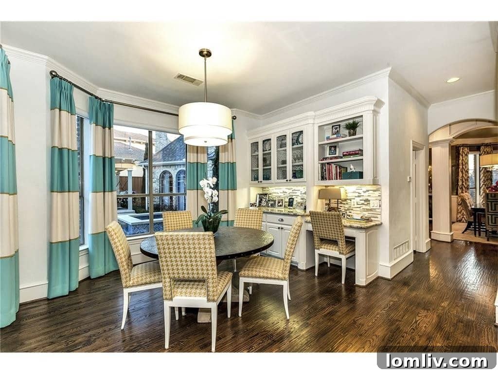 Bright and airy breakfast nook in Frisco home, ideal for casual family meals.