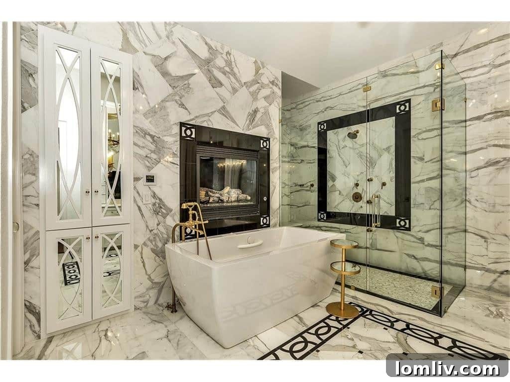 Shay Geyer: Vote for IBB Design's Rising Star in Traditional Home Competition 15 Luxurious master bathroom in Frisco home, featuring elegant fixtures and spacious layout.