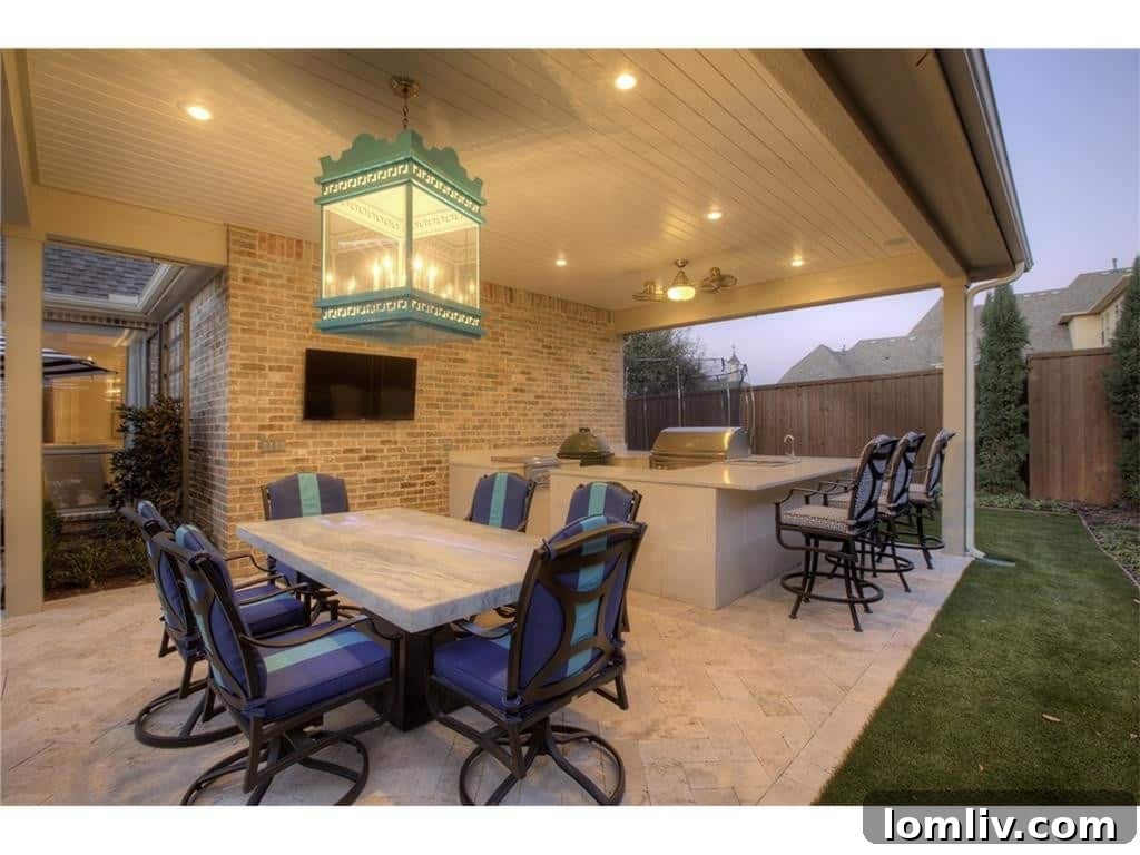 Shay Geyer: Vote for IBB Design's Rising Star in Traditional Home Competition 29 Outdoor kitchen area, ideal for al fresco dining and entertaining.