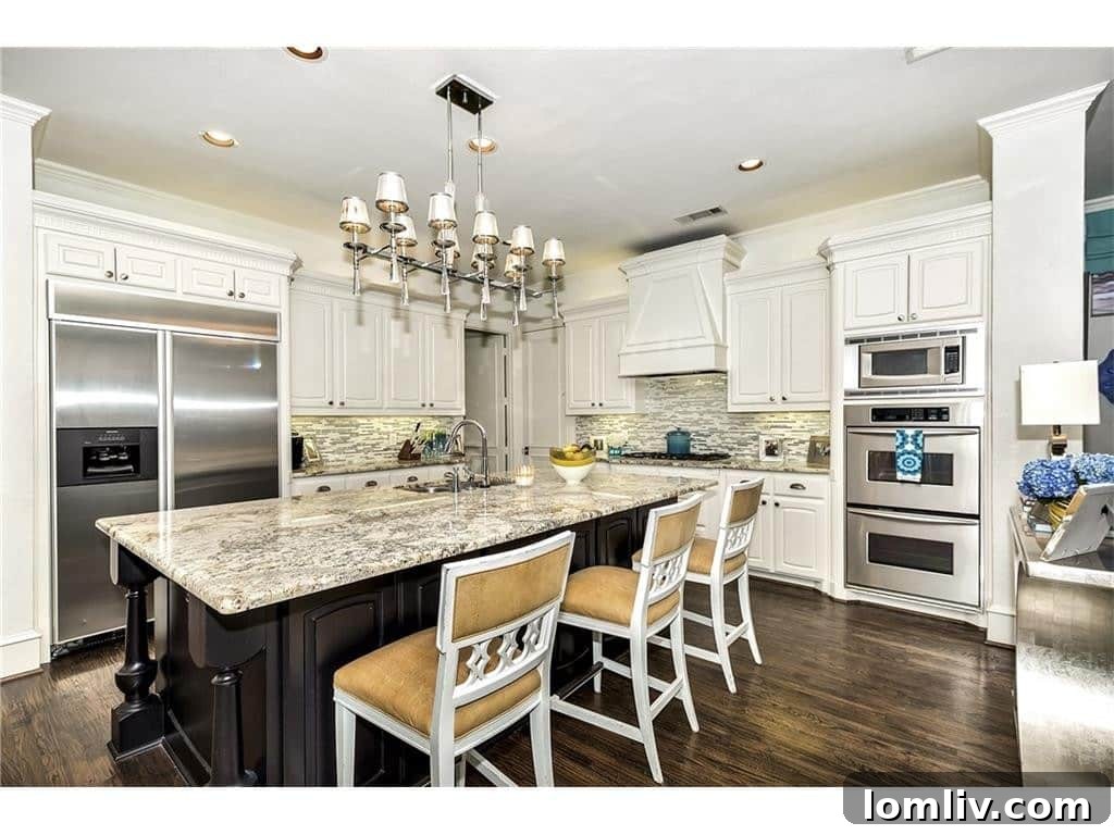 Shay Geyer: Vote for IBB Design's Rising Star in Traditional Home Competition 9 Modern, fully equipped kitchen at 5504 Burkett, a chef's delight with ample counter space.