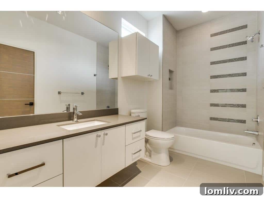 Stylish Secondary Bathroom with High-Quality Finishes and Clean Lines