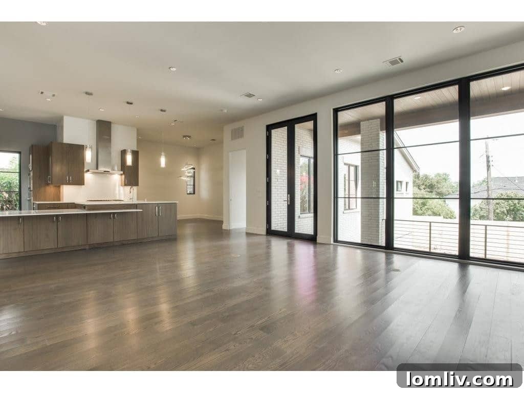 Elegant Hallway Leading to Open Spaces in Contemporary Dallas Residence