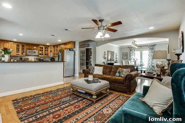 Master bedroom with carpeting and natural light