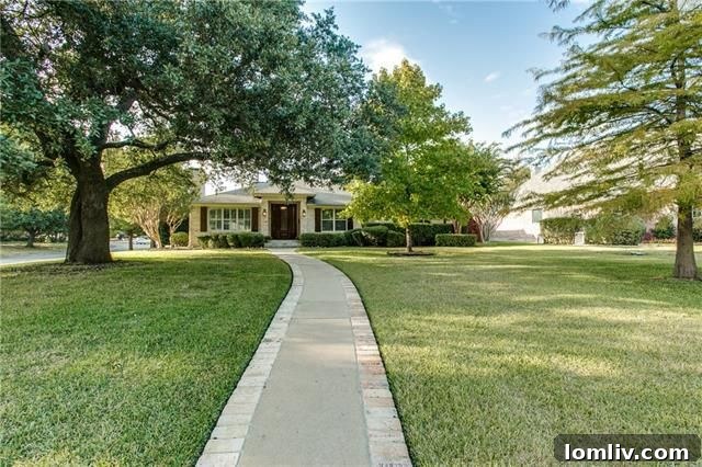 Elegant exterior view of the luxury ranch home at 6107 Royalton Dr