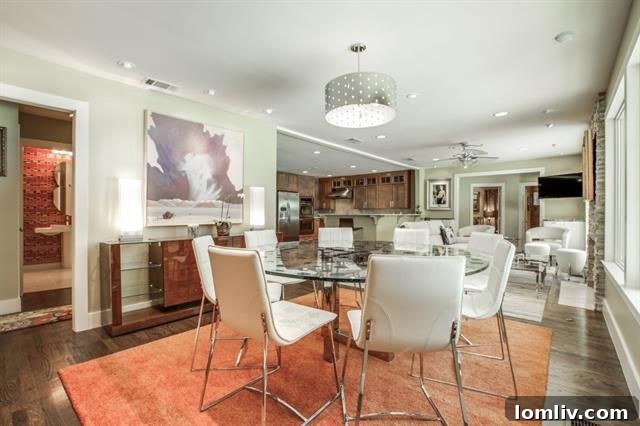 Luxurious master bathroom with stacked stone shower in Forest Hills home