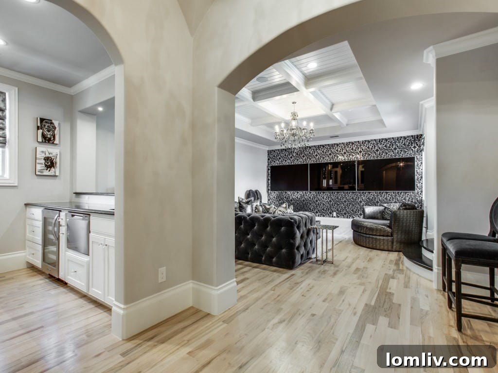 Triple screen media room for ultimate entertainment in a luxury residence