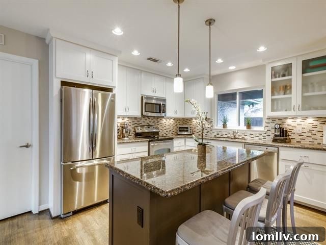 Sleek vanity and shower in one of the home's updated bathrooms