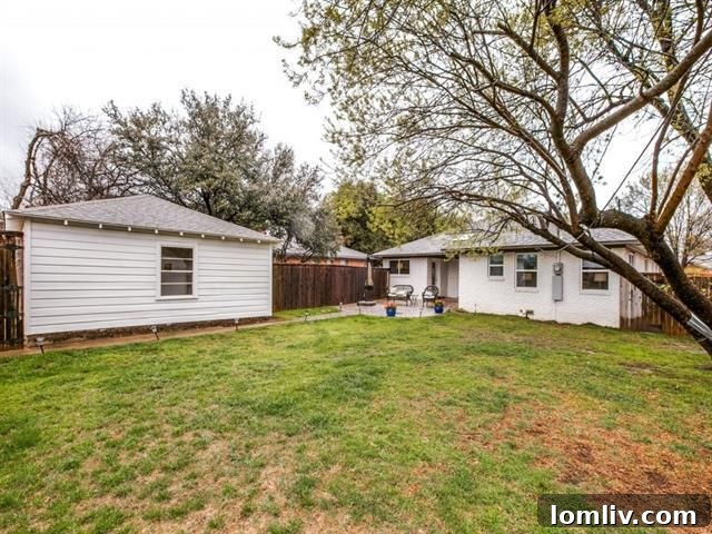 View of the integrated living and dining area, emphasizing natural light