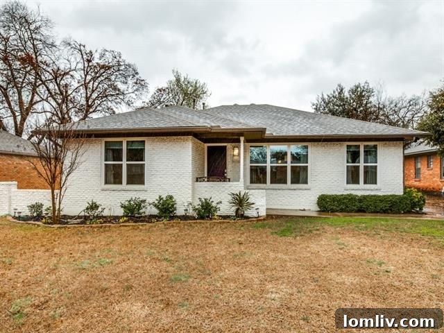Close-up of the charming painted brick facade of 6108 Town Hill Ln