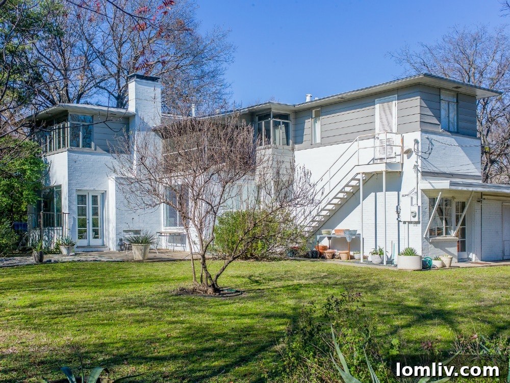 Lakewood's Modernist Jacotte House: A Preservation Gem For Sale 4 Interior view of Howard Meyer's Jacotte House living space with natural light