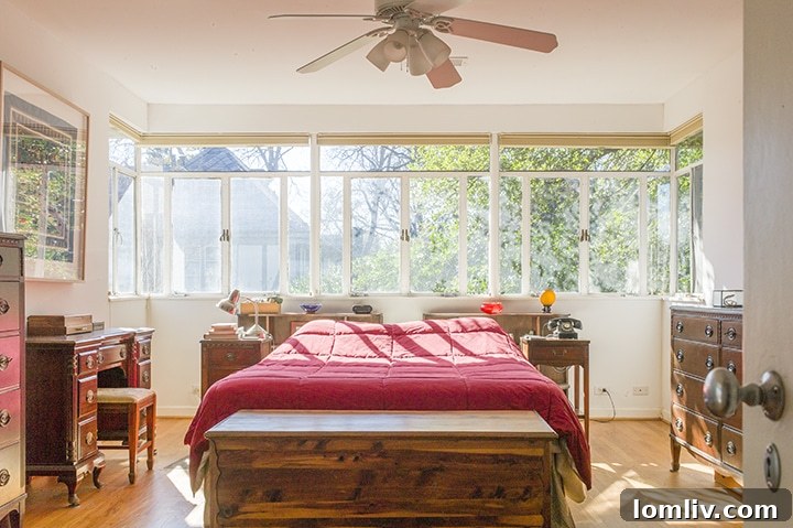 Lakewood's Modernist Jacotte House: A Preservation Gem For Sale 6 Bedroom with elegant French doors leading to a screened porch