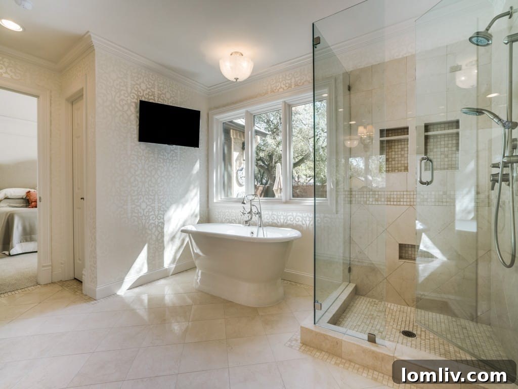 Elegant Master Bathroom with Aerin Lauder Chandelier and Soaking Tub