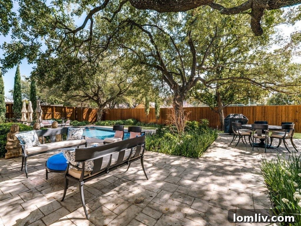 Luxurious Outdoor Entertaining Area with Pool and Harold Leidner Landscaping