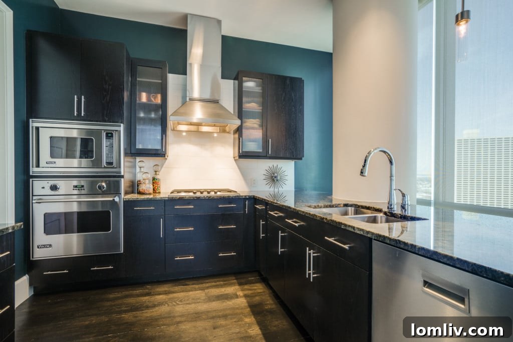 Luxurious master bedroom with king-sized bed and city views