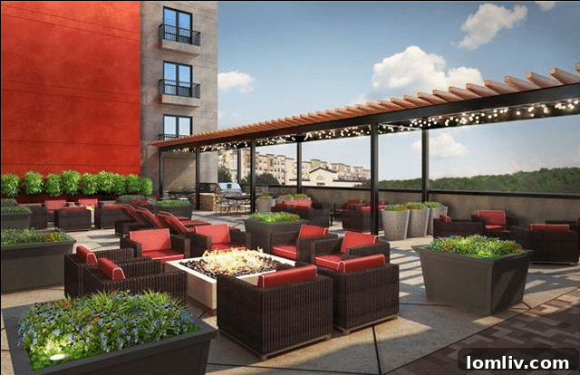 Panoramic views of the Dallas skyline from The Shelby Residences rooftop terrace with fire pits