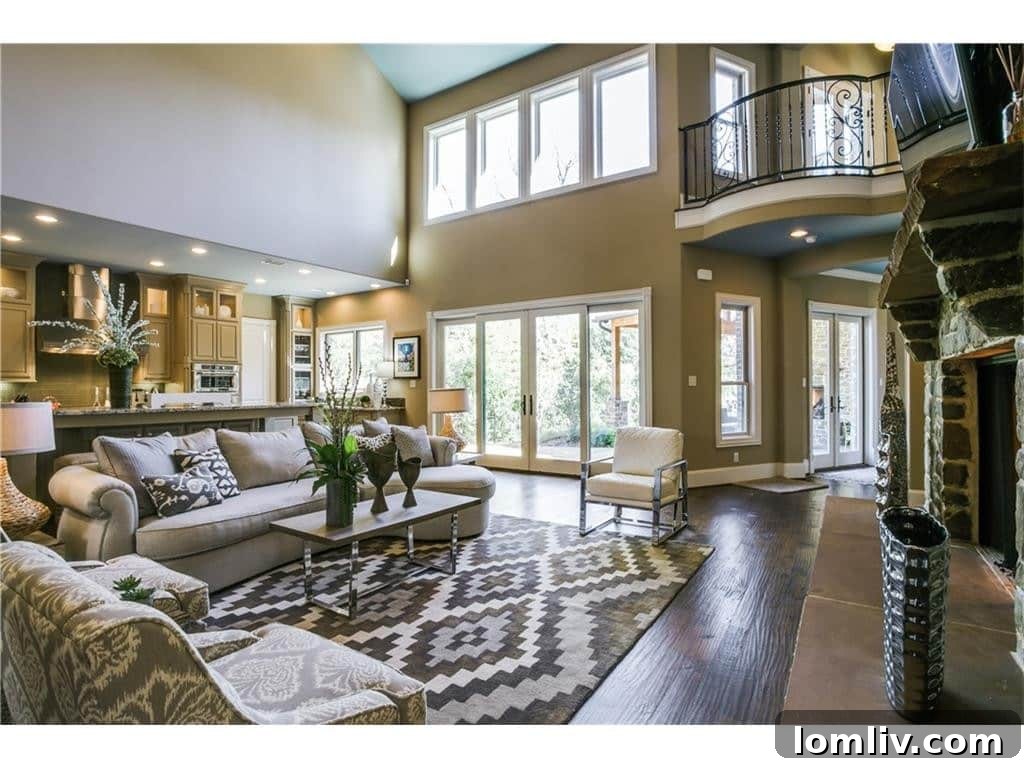 Family room with views of the backyard through large windows