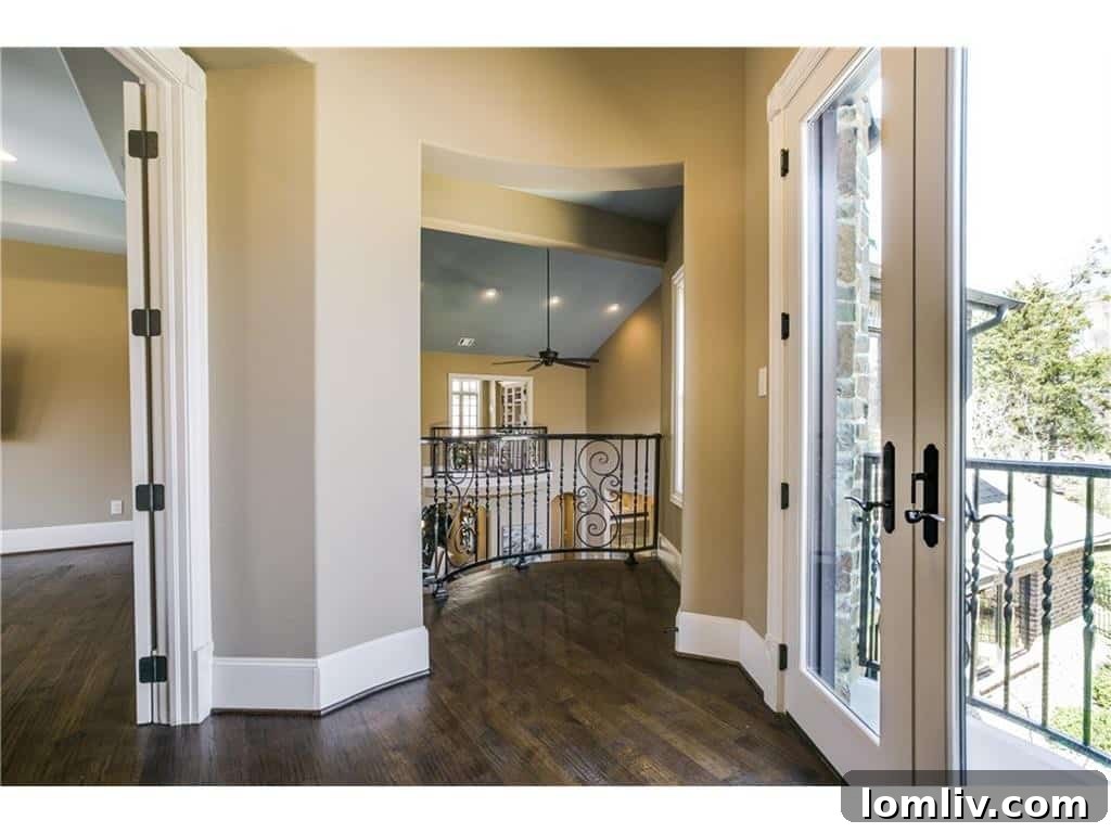 Upstairs hallway or balcony overlooking the lower level