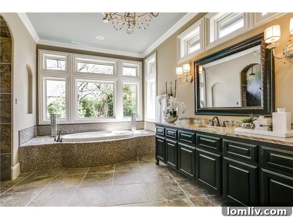 Spa-like master bathroom with dual vanities and modern fixtures