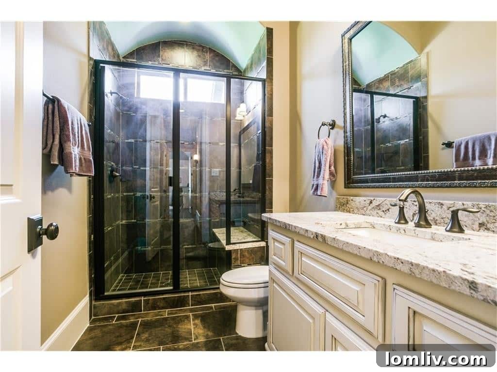 Spacious and modern shower in one of the bathrooms