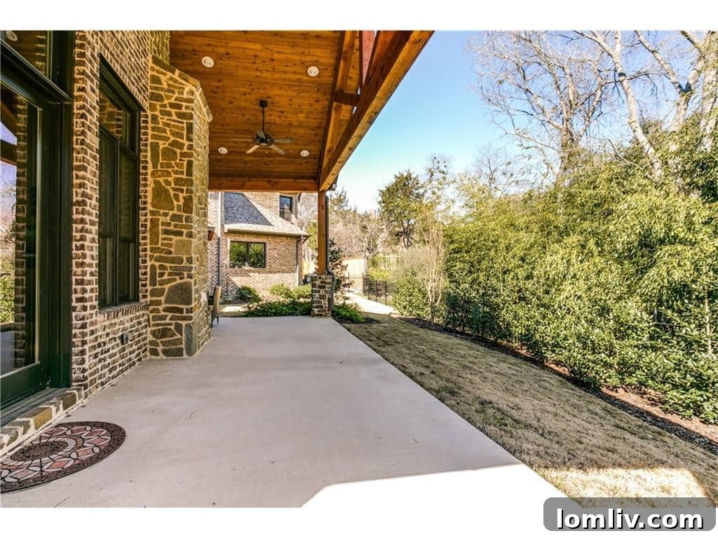 Inviting outdoor porch with views of the property