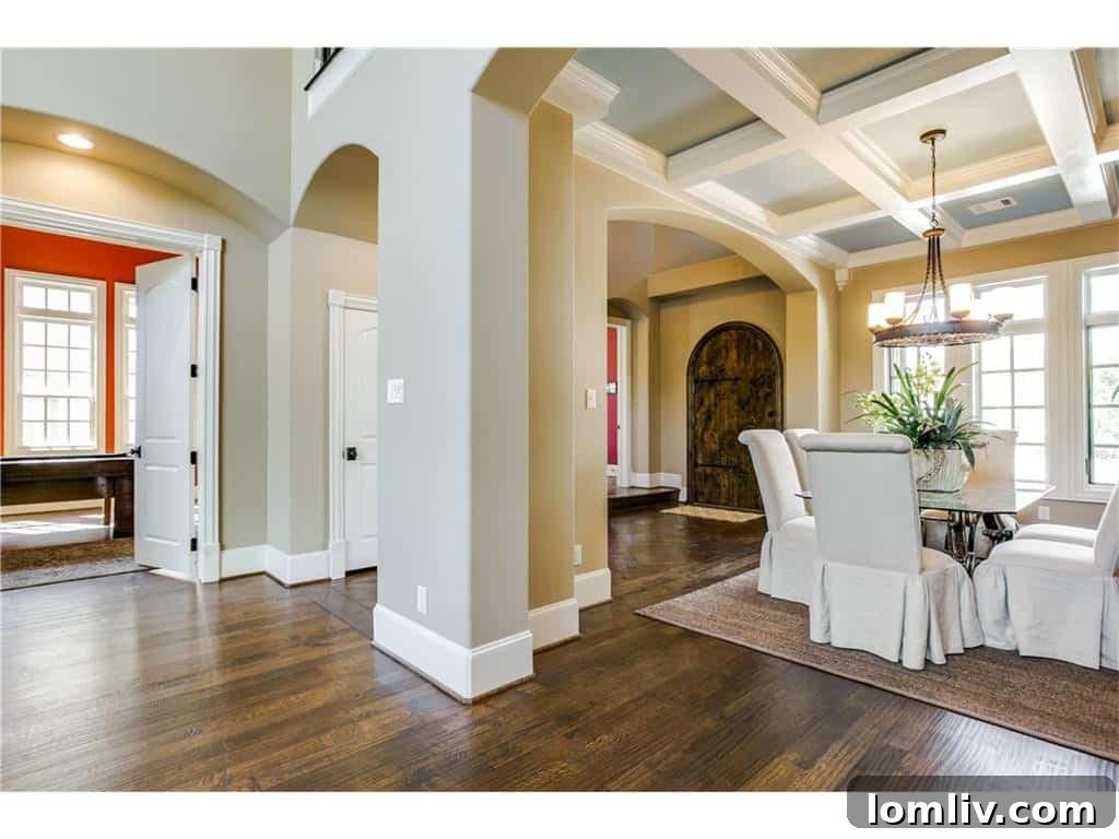 Grand foyer with high ceilings and elegant staircase