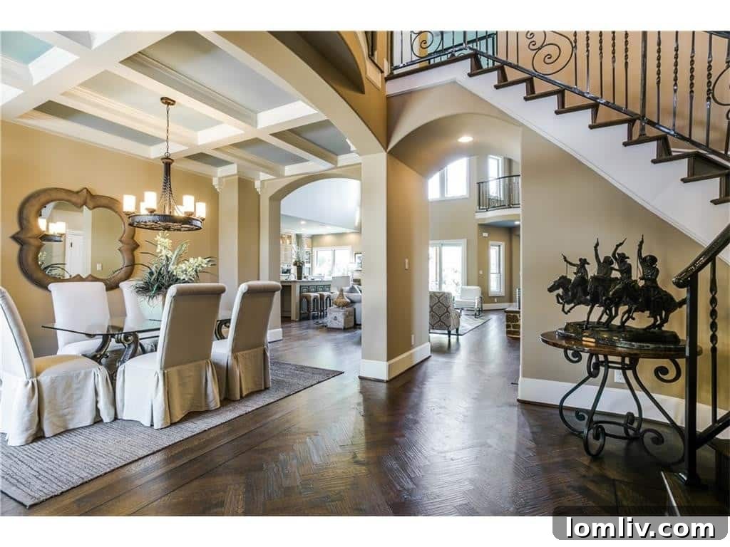 Elegant dining room with chandelier and large windows