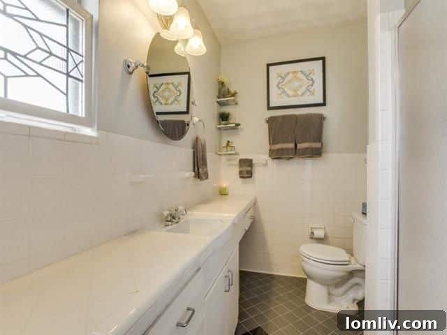 Another perspective of the renovated kitchen with abundant counter space