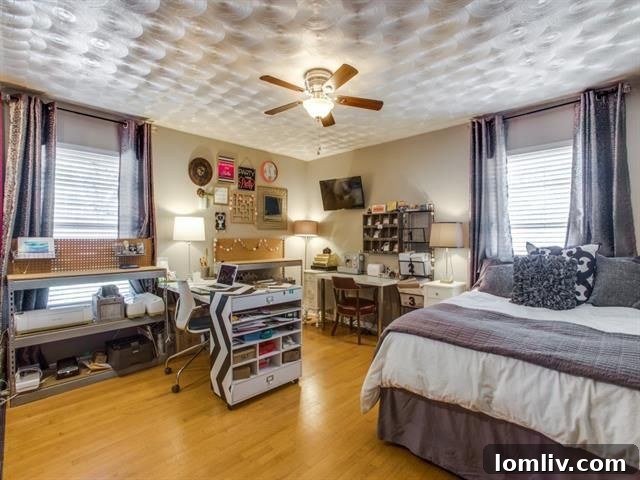 Elegant primary bathroom featuring a double vanity and sleek finishes