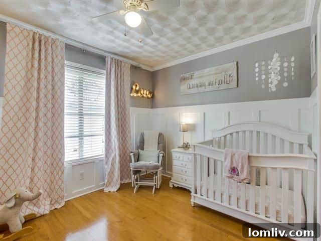 Walk-in shower with modern tiling in one of the bathrooms