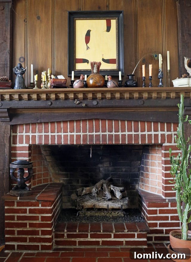 Explore Charles Dilbeck's Iconic Designs in the Cochran Heights Home Tour 5 A detailed view of the fireplace in the living room of 5106 Milam, highlighting original craftsmanship and a cozy ambiance within the Dilbeck design.