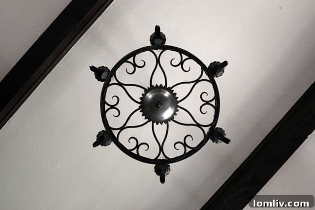 Explore Charles Dilbeck's Iconic Designs in the Cochran Heights Home Tour 7 The distinctive front entry and facade of 5106 Milam, illustrating the unique blend of architectural styles characteristic of Charles Dilbeck's work.