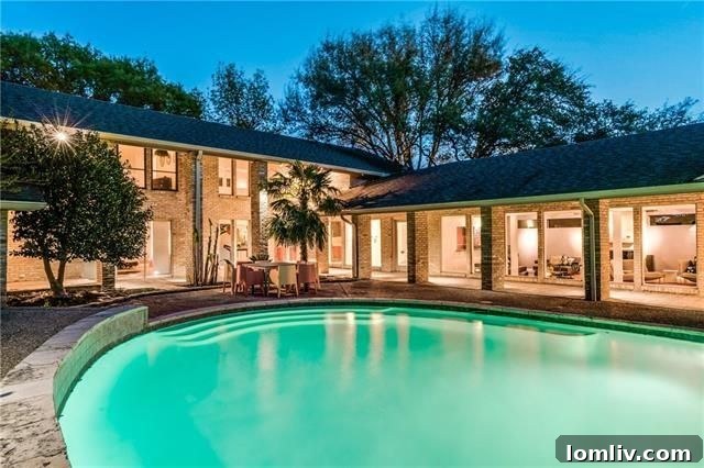 Your Weekend Passport to 5 Stellar Dallas Open Houses 2 Stunning backyard oasis featuring a large oval pool at 6868 Meadowcreek Drive, Northwood Hills, Dallas