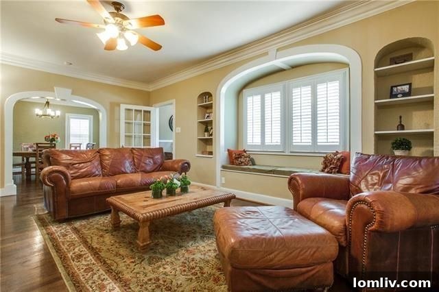 Your Weekend Passport to 5 Stellar Dallas Open Houses 24 Inviting living room with original fireplace, high ceilings, and dark stained hardwoods at 5408 McCommas Blvd