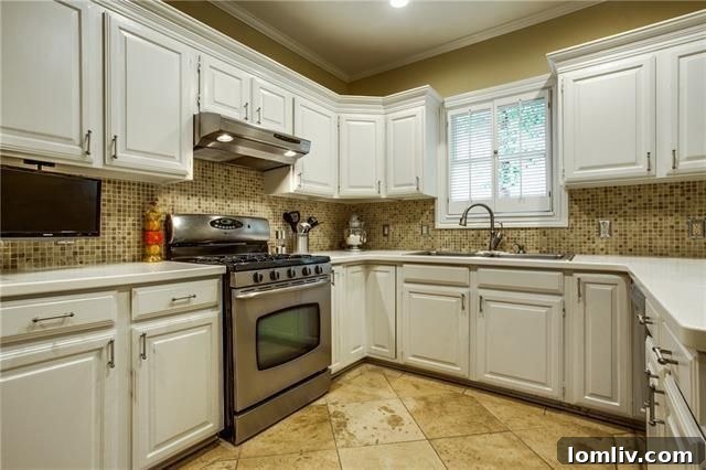 Your Weekend Passport to 5 Stellar Dallas Open Houses 25 Bright and modern kitchen with stainless steel appliances and abundant white cabinets at 5408 McCommas Blvd