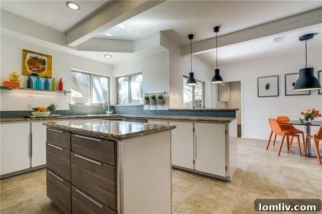 Your Weekend Passport to 5 Stellar Dallas Open Houses 5 Modern kitchen with stainless steel appliances and sleek cabinetry at 6868 Meadowcreek Drive