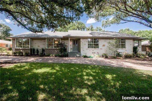 Your Weekend Passport to 5 Stellar Dallas Open Houses 8 Exterior facade of 7037 Royal Ln in Hillcrest Havens with new stonework and landscaping