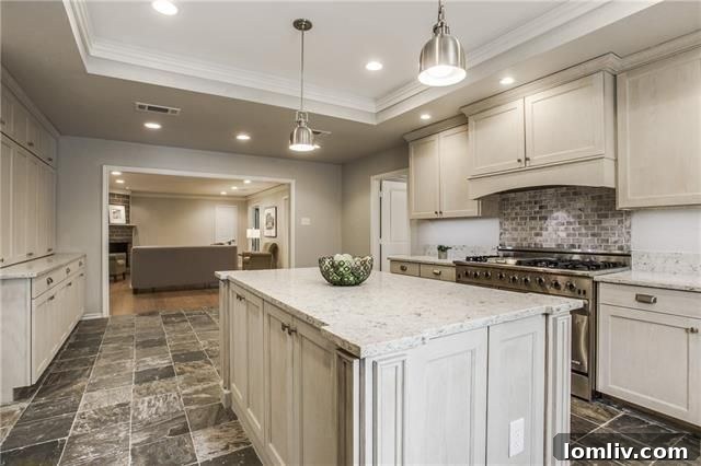 Your Weekend Passport to 5 Stellar Dallas Open Houses 10 Spacious great room featuring decorative beams and new energy-efficient windows at 7037 Royal Ln
